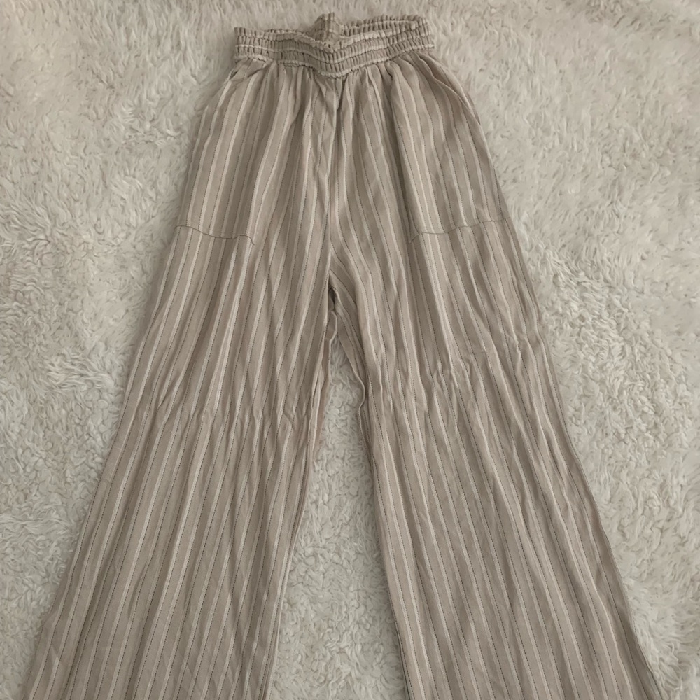 Fit and flair cream and white pants.